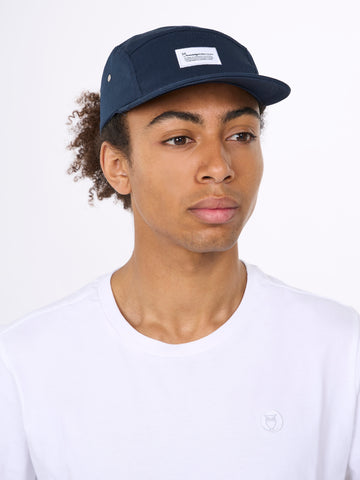 KnowledgeCotton Apparel - UNI Barckley cap with badge Caps 1001 Total Eclipse